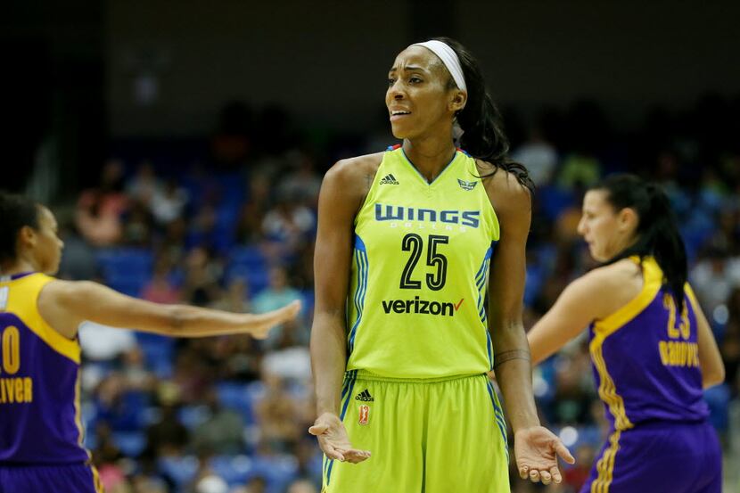 Dallas Wings forward Glory Johnson (25) reacts to a call in the first half during a Women's...