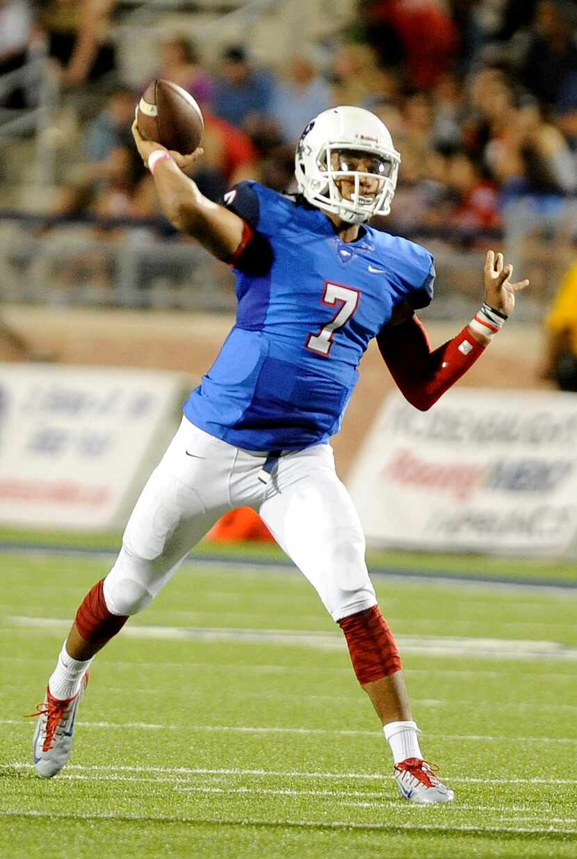 Allen quarterback Seth Green (7) throws in the second quarter during a high school football...