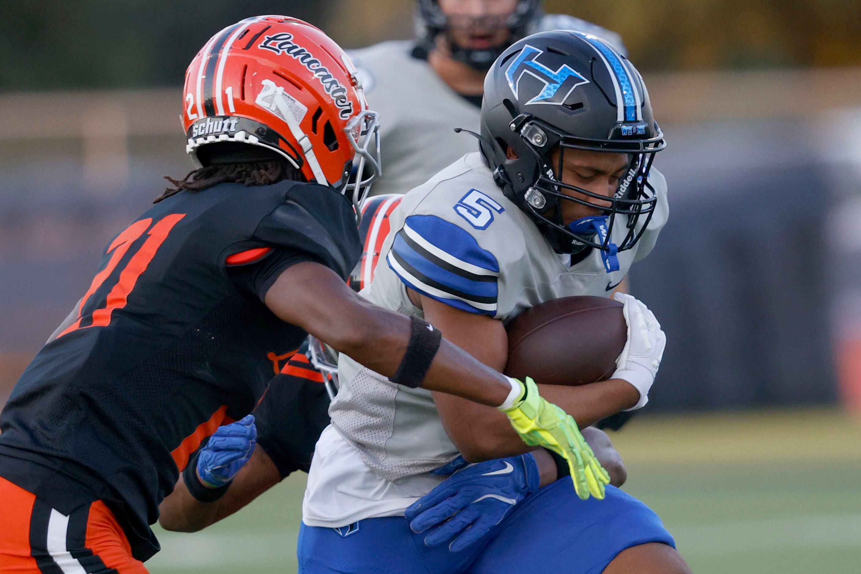 Hebron’s Ayson McCray Jones is tackled by Messiah Boulieu (21) in the first half of a high...