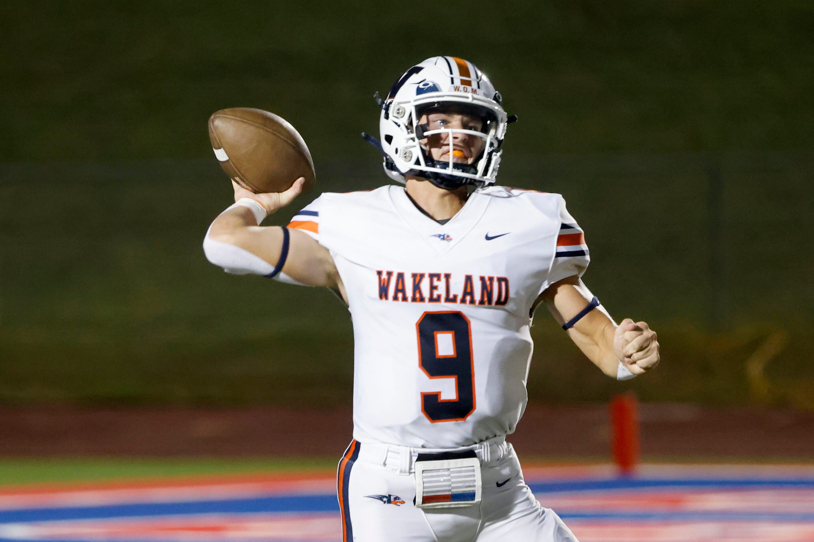 Frisco Wakeland quarterback Brennan Myer (9) throws against Grapevine during a high school...