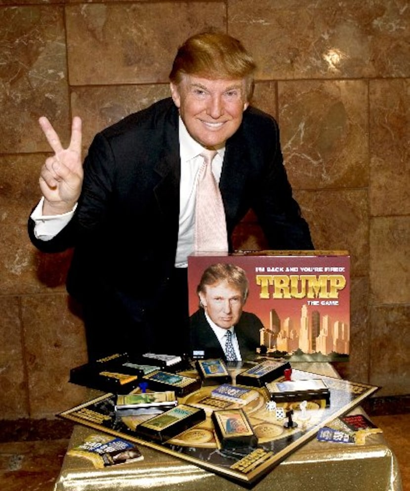 Donald Trump launches the new board game, "Trump the Game," during a news conference at...