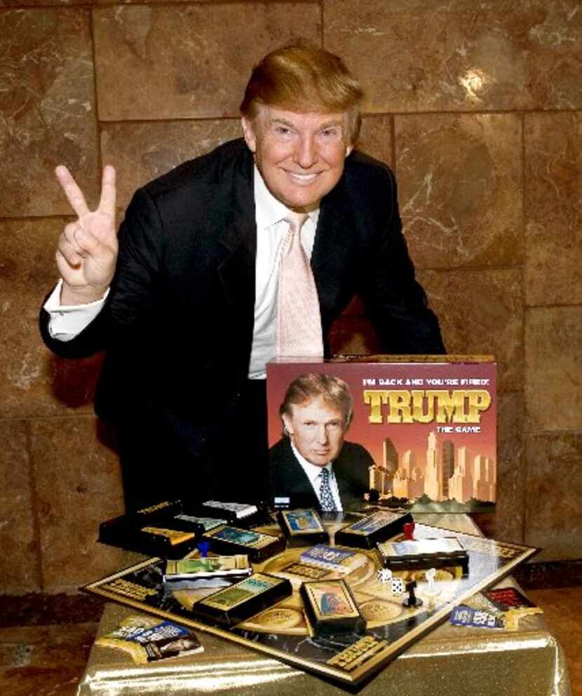 Donald Trump launches the new board game, "Trump the Game," during a news conference at...