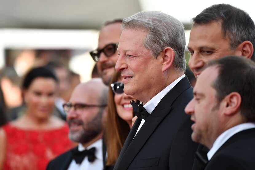 Former US vice president Al Gore (C) poses as he arrives on May 22, 2017 for the screening...