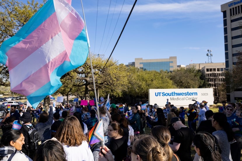 Protestors gather at the University of Texas Southwestern Medical Center following the...