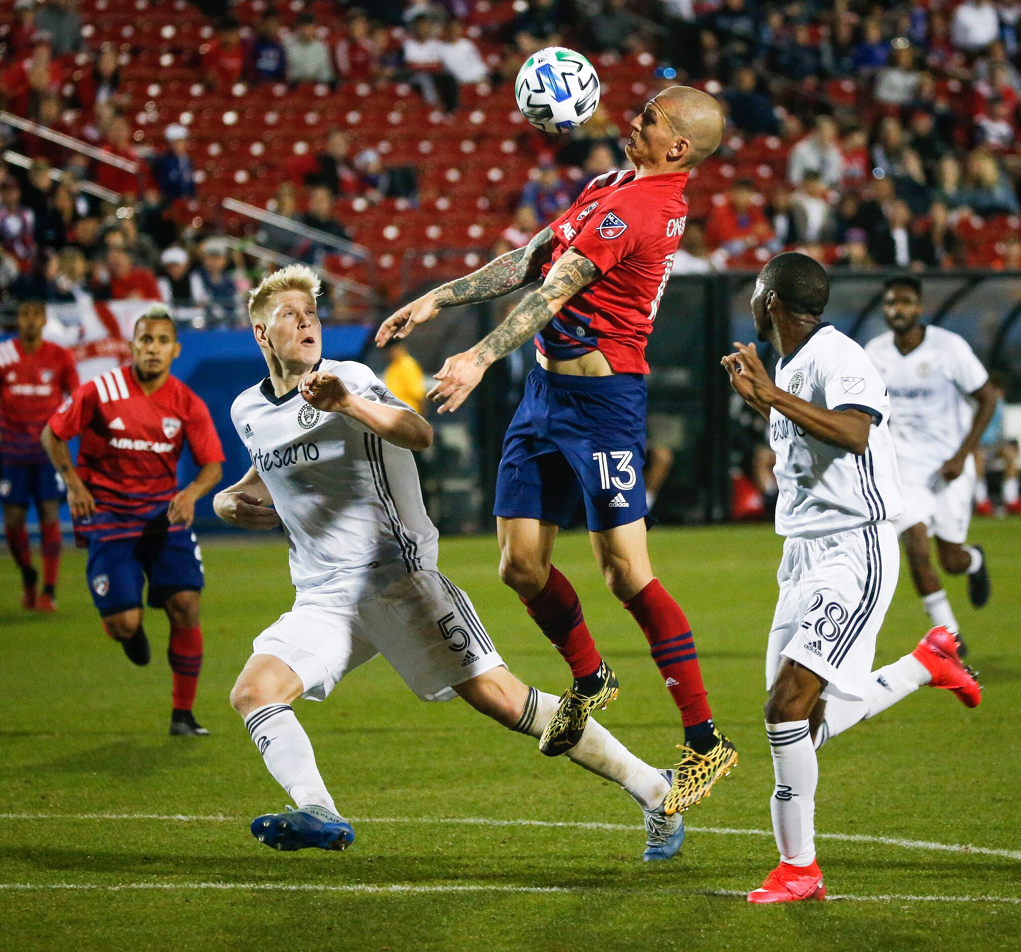 FC Dallas attacker Zdenek Ondrasek (13) receives the ball over Philadelphia Union defender...