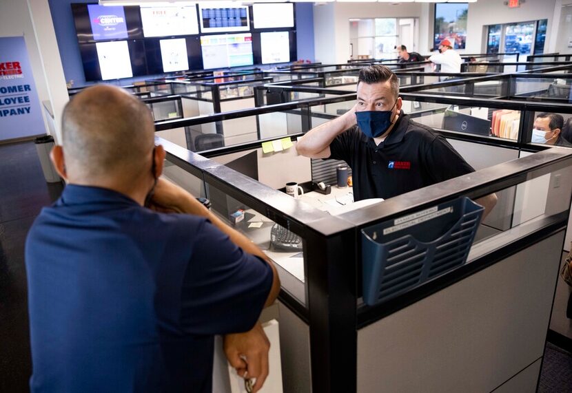 James Sotero (left), general manager of the electrical department, and Jose Ramos, service...