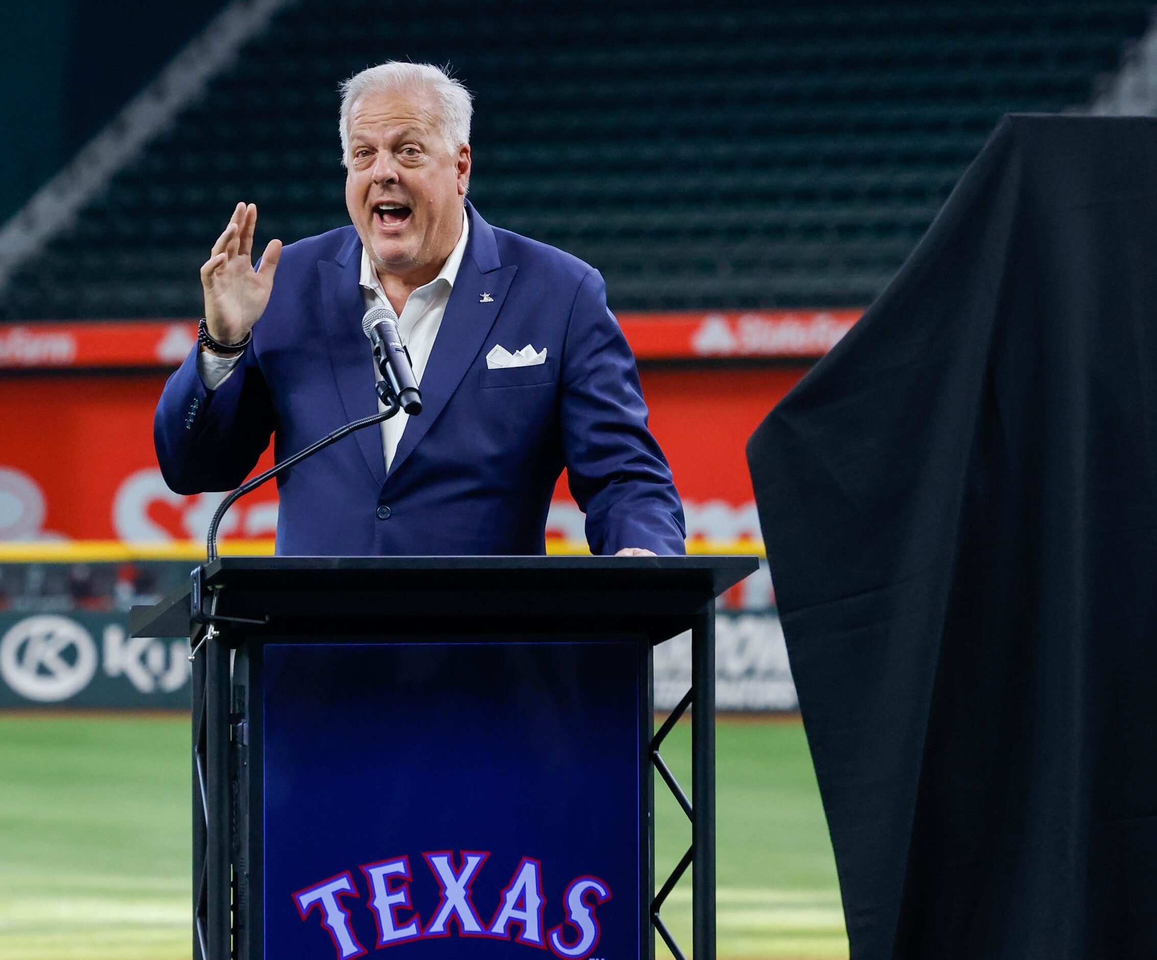 Jim Ross, mayor of the city of Arlington, speaks before the official logo for the 2024...