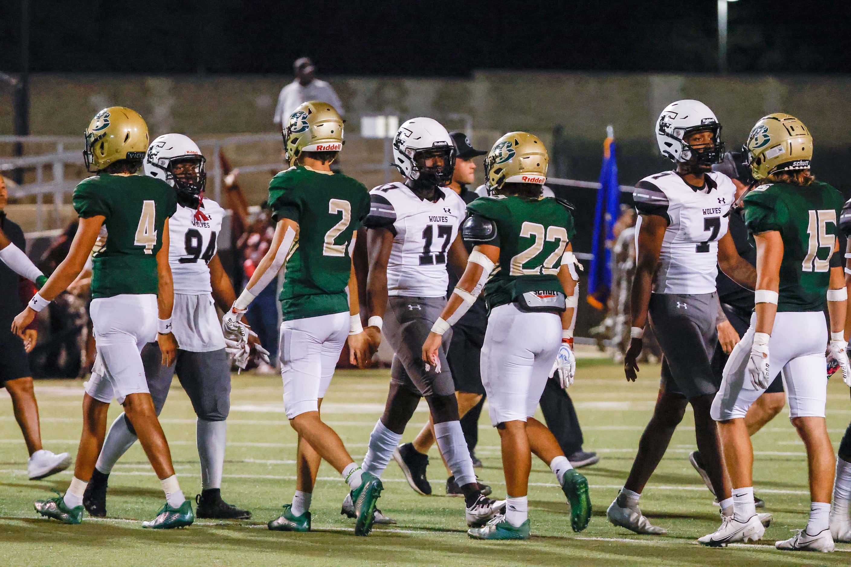 Mansfield Timberview players shake hands with Birdville after Mansfield’s win at the...