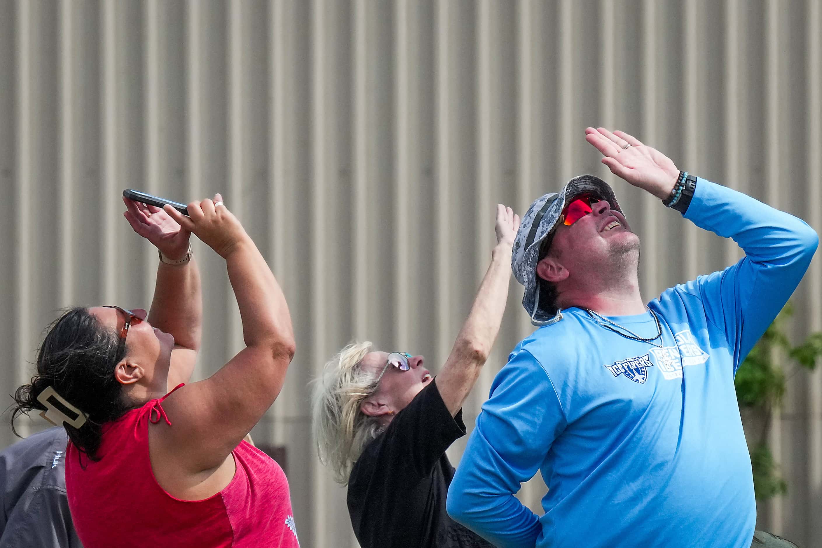 Spectators looks skyward as the Blue Angels perform at the Wings Over Cowtown Airshow on...