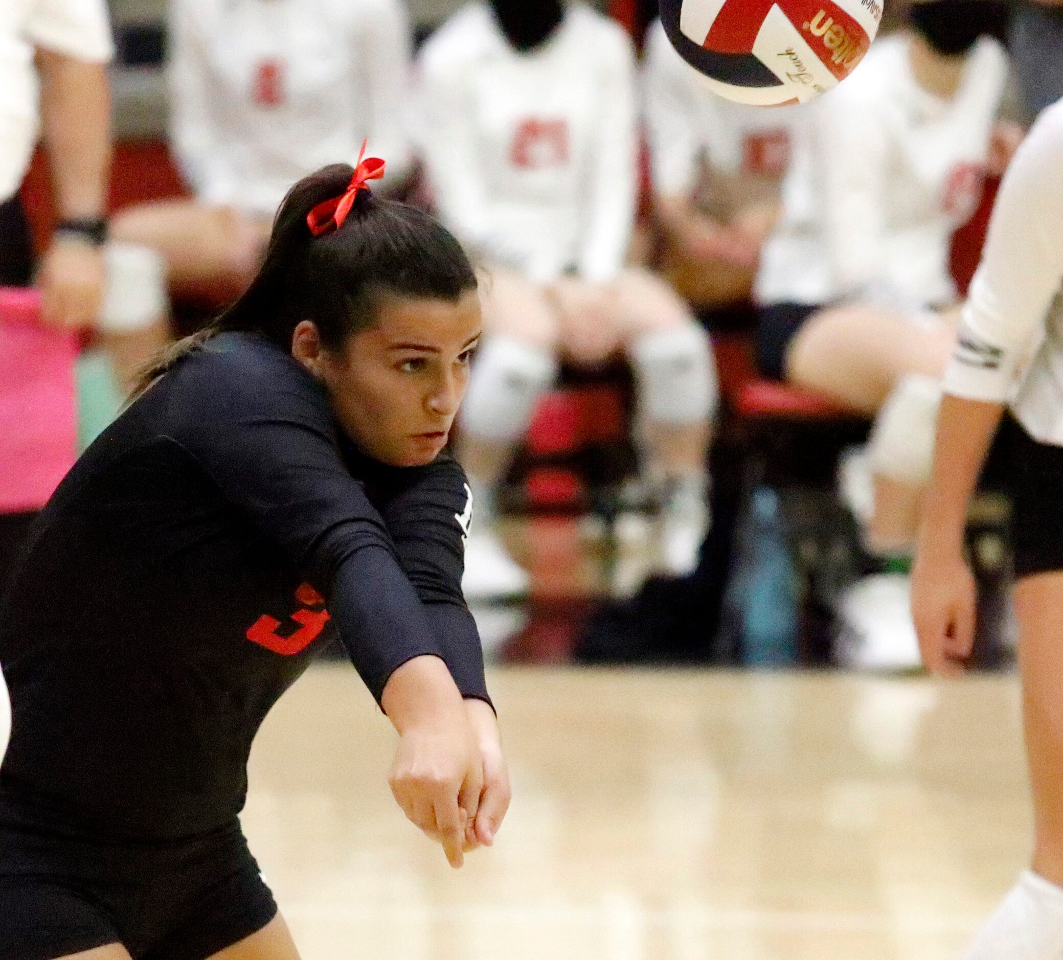 Lovejoy High School libero Callie Kemohah returns a serve during game one as Lovejoy High...