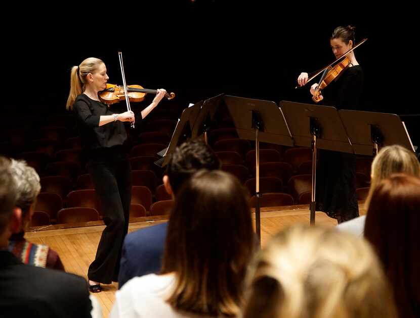 Angela Fuller Heyde (left) and Sarah Kienle perform as part of the Dallas Symphony...