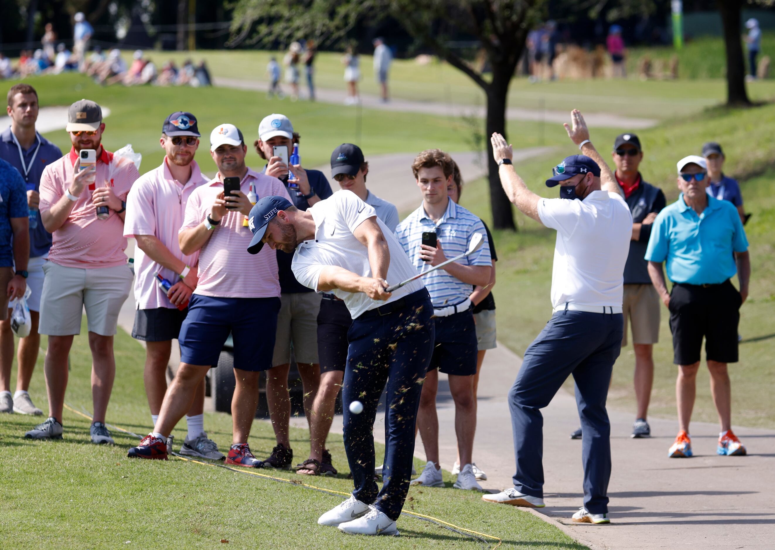 Wyndham Clark hits from the rough on the 16th hole during round 1 of the AT&T Byron Nelson ...