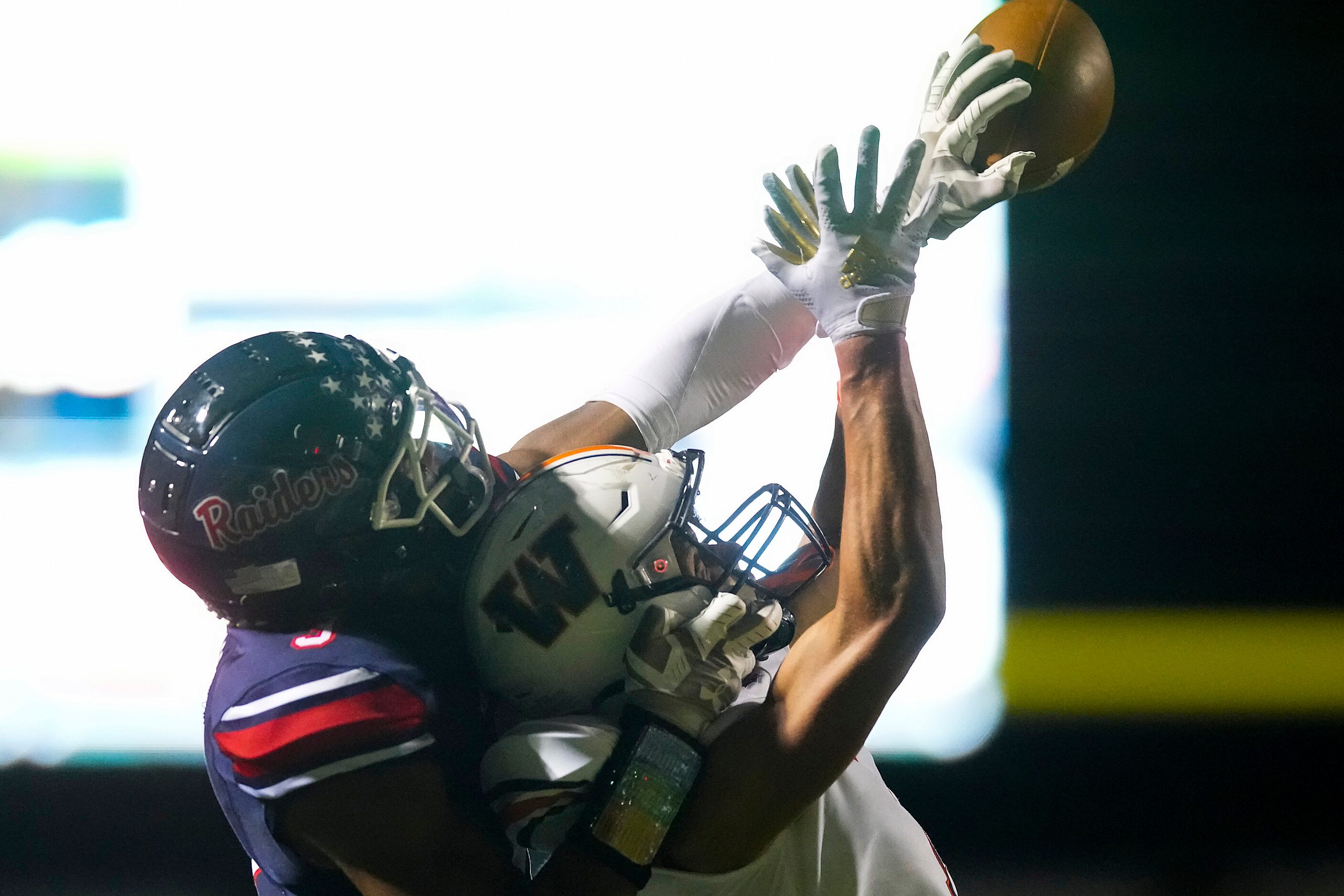 Denton Ryan defensive back Austin Jordan (3) breaks up a pass intended for Frisco Wakeland...