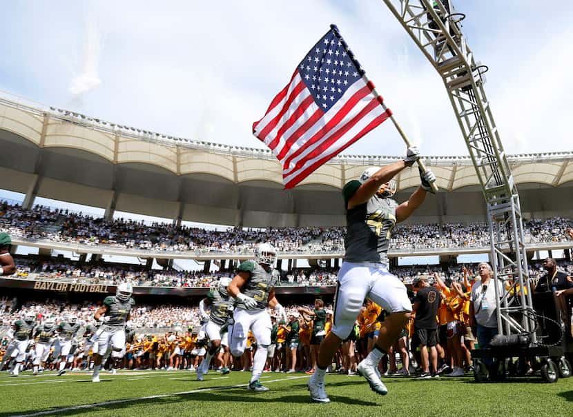 Baylor players take the field against SMU at McLane Stadium in Waco, Texas, Saturday, Sept....