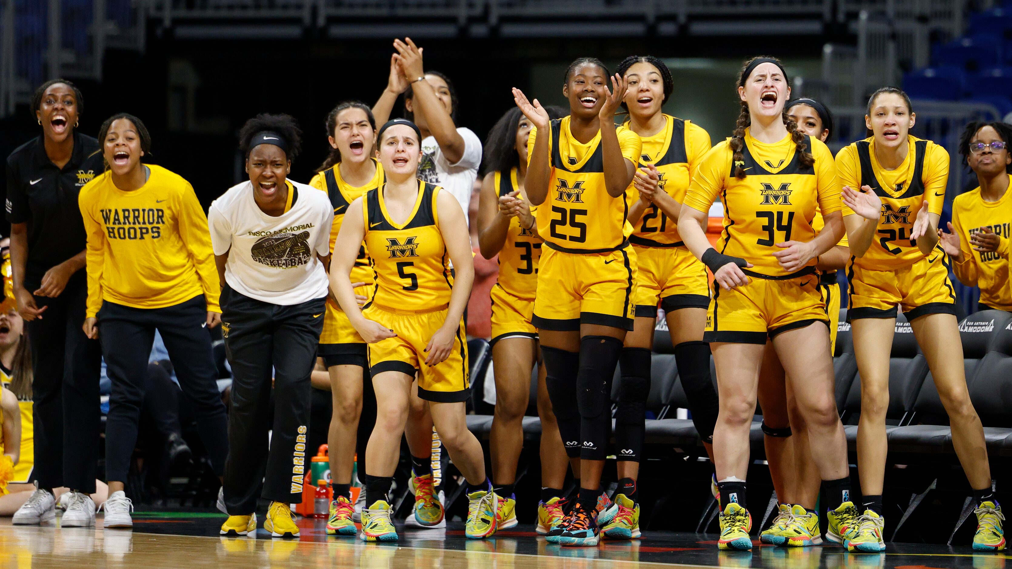 Frisco Memorial players react after a made basket and called foul during the first half of...