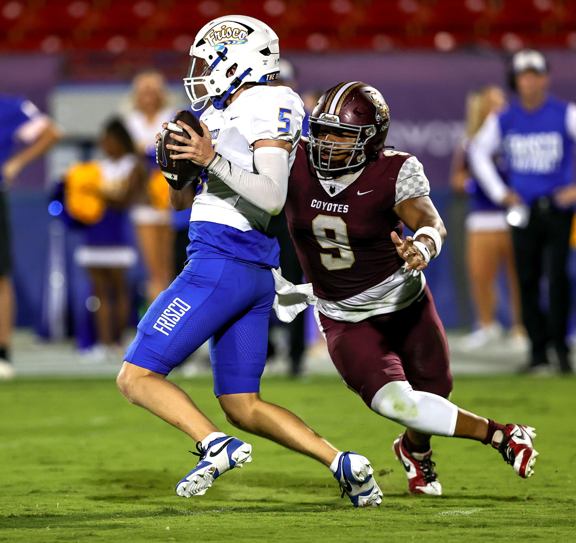 Frisco quarterback Cobyn Harbert (5) gets pressure from Frisco Heritage defensive end...