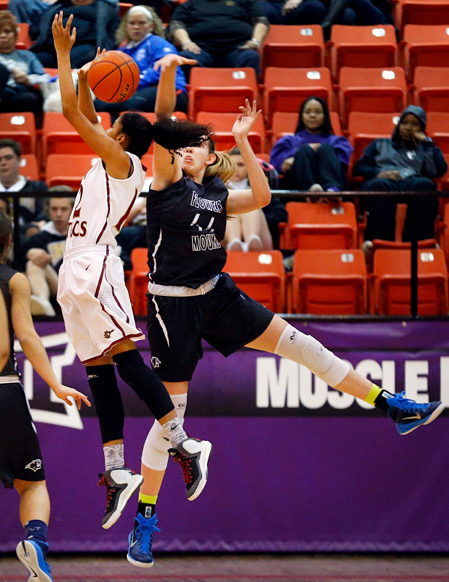 Flower Mound center Lauren Cox (44) blocks a shot by El Paso El Dorado guard Ebonie...