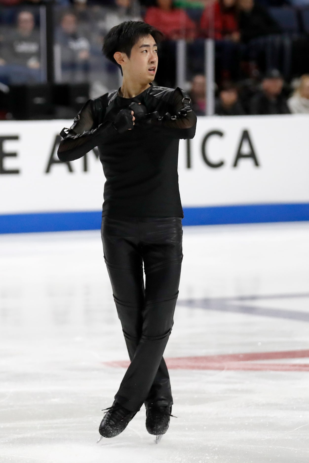 Tatsuya Tsuboi, of Japan, competes in the men's free skate program during the Skate America...