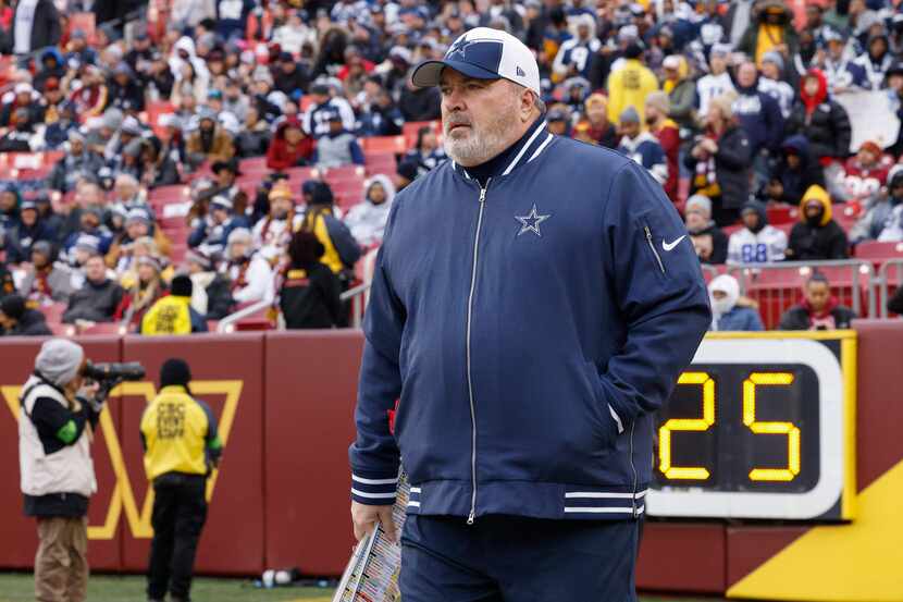 Dallas Cowboys head coach Mike McCarthy takes the field before the first half of an NFL...