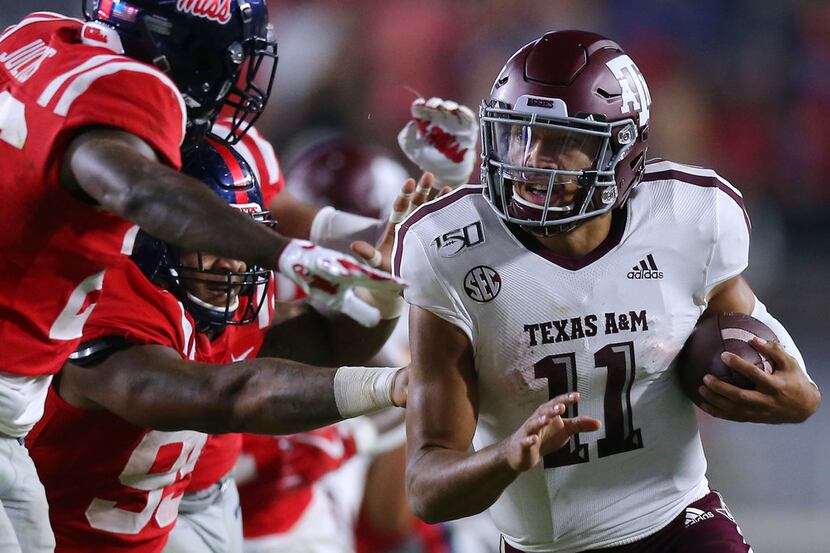 OXFORD, MISSISSIPPI - OCTOBER 19: Kellen Mond #11 of the Texas A&M Aggies runs with the ball...
