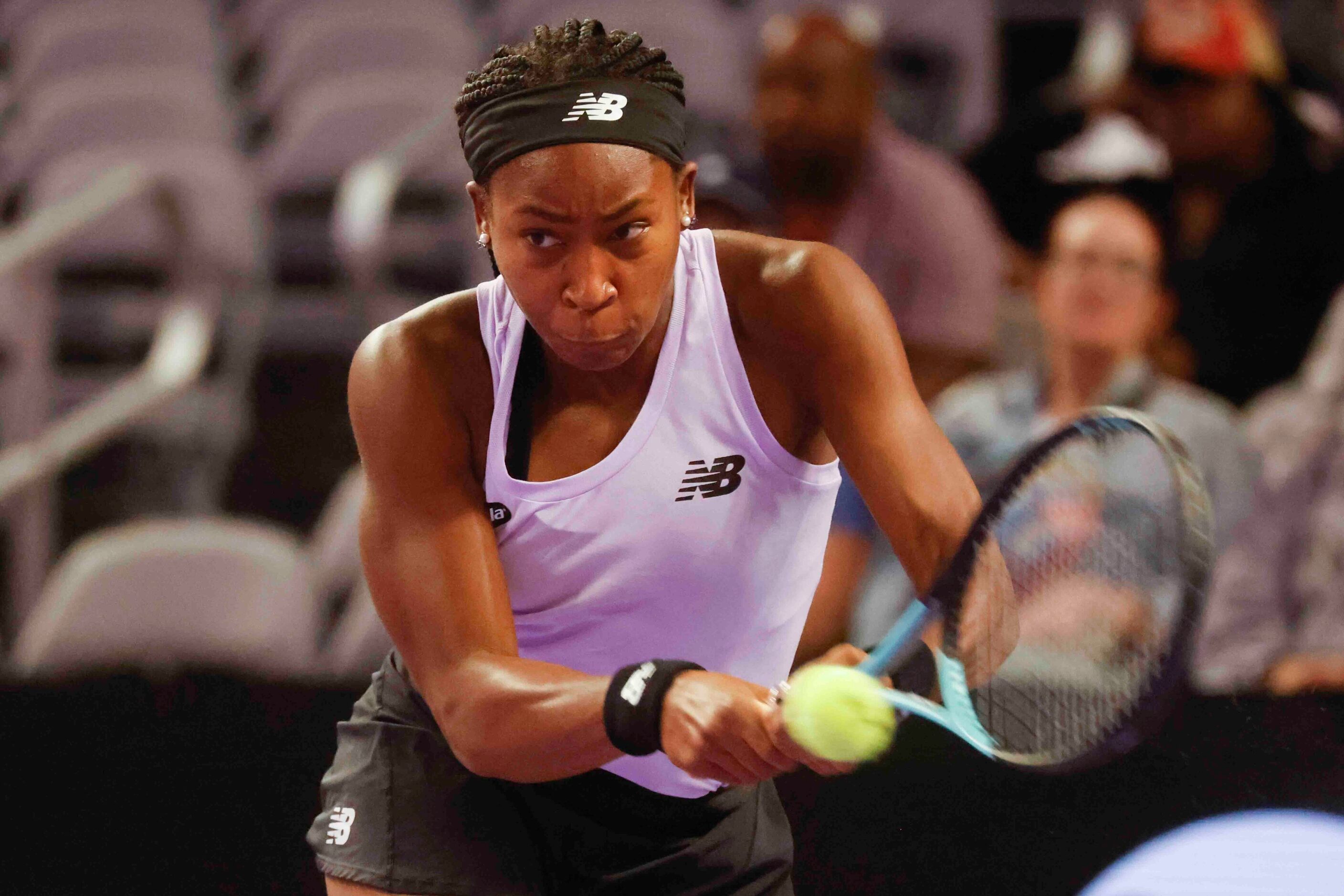 Coco Gauff of the USA returns a shot against Caroline Garcia of France on day two of the WTA...