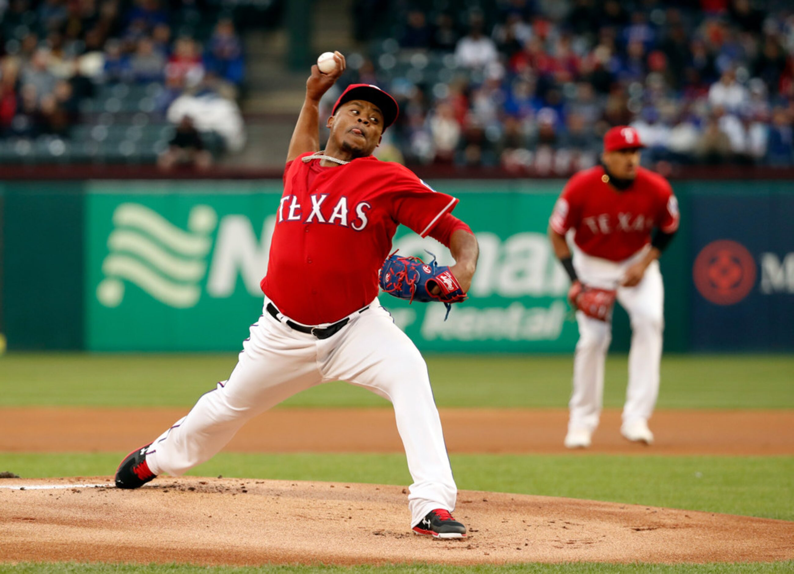 Texas Rangers starting pitcher Edinson Volquez (36) throws to the Chicago Cubs in the first...