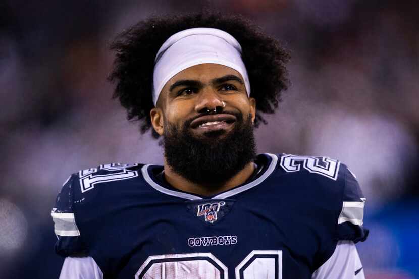 Dallas Cowboys running back Ezekiel Elliott (21) smiles after a touchdown during the fourth...