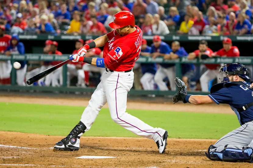 Texas Rangers designated hitter Carlos Beltran connects on a solo home run during the third...