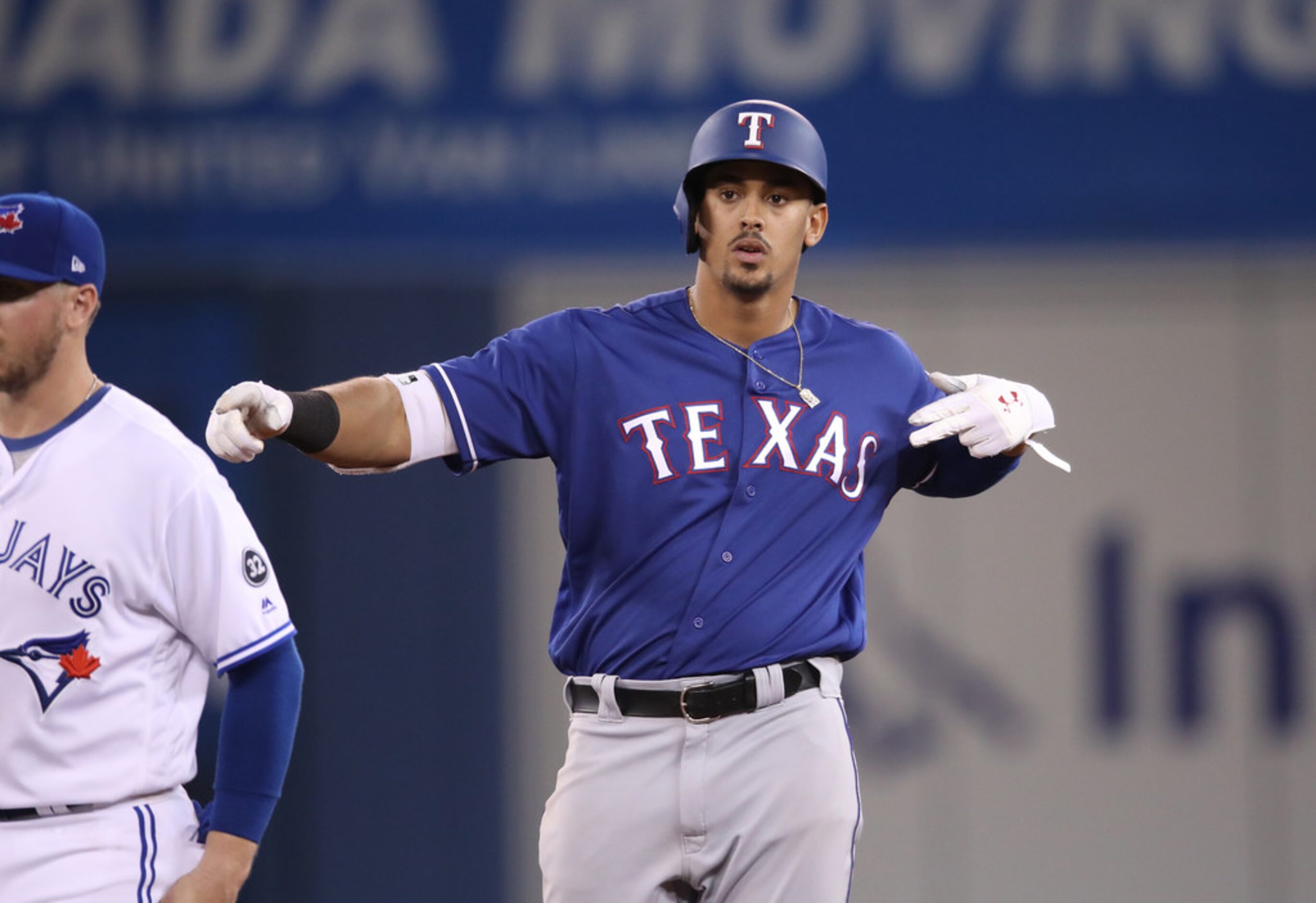 TORONTO, ON - APRIL 27: Ronald Guzman #67 of the Texas Rangers reacts after hitting a double...