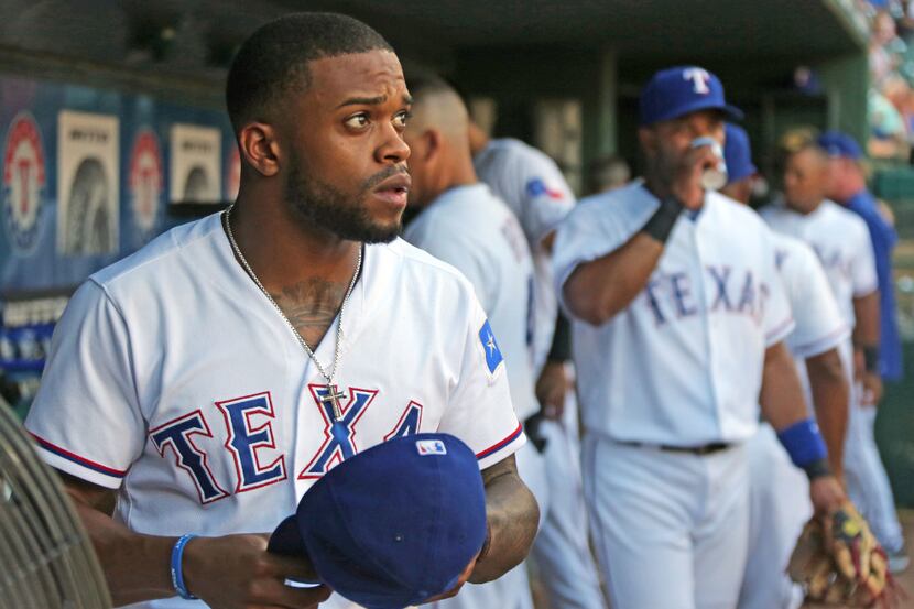 Texas Rangers left fielder Delino DeShields (3) is pictured in the dugout during the Detroit...