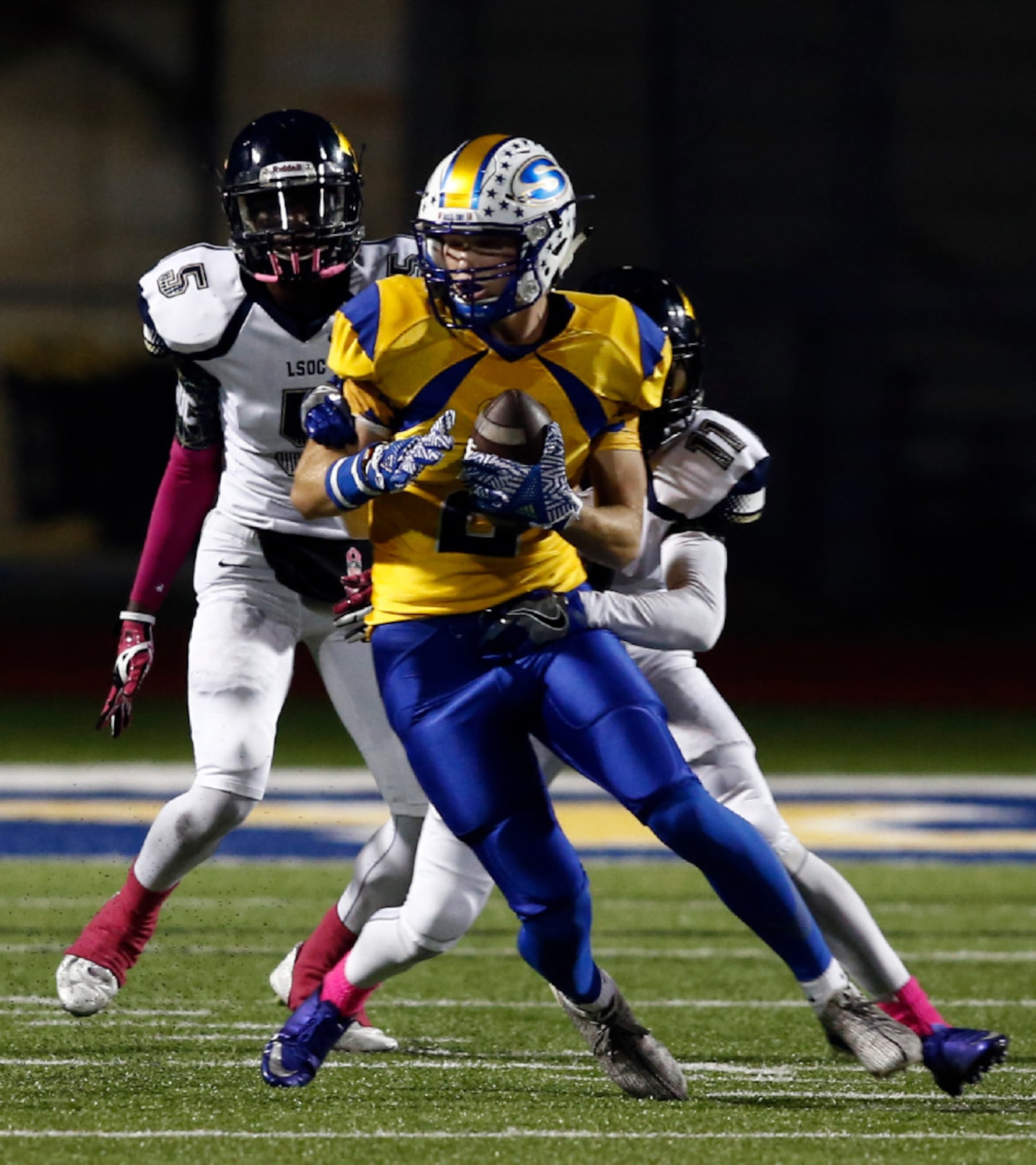 Sunnyvale wide receiver Cash Goodhart (2) is wrapped up by Life Oak Cliff defensive back...