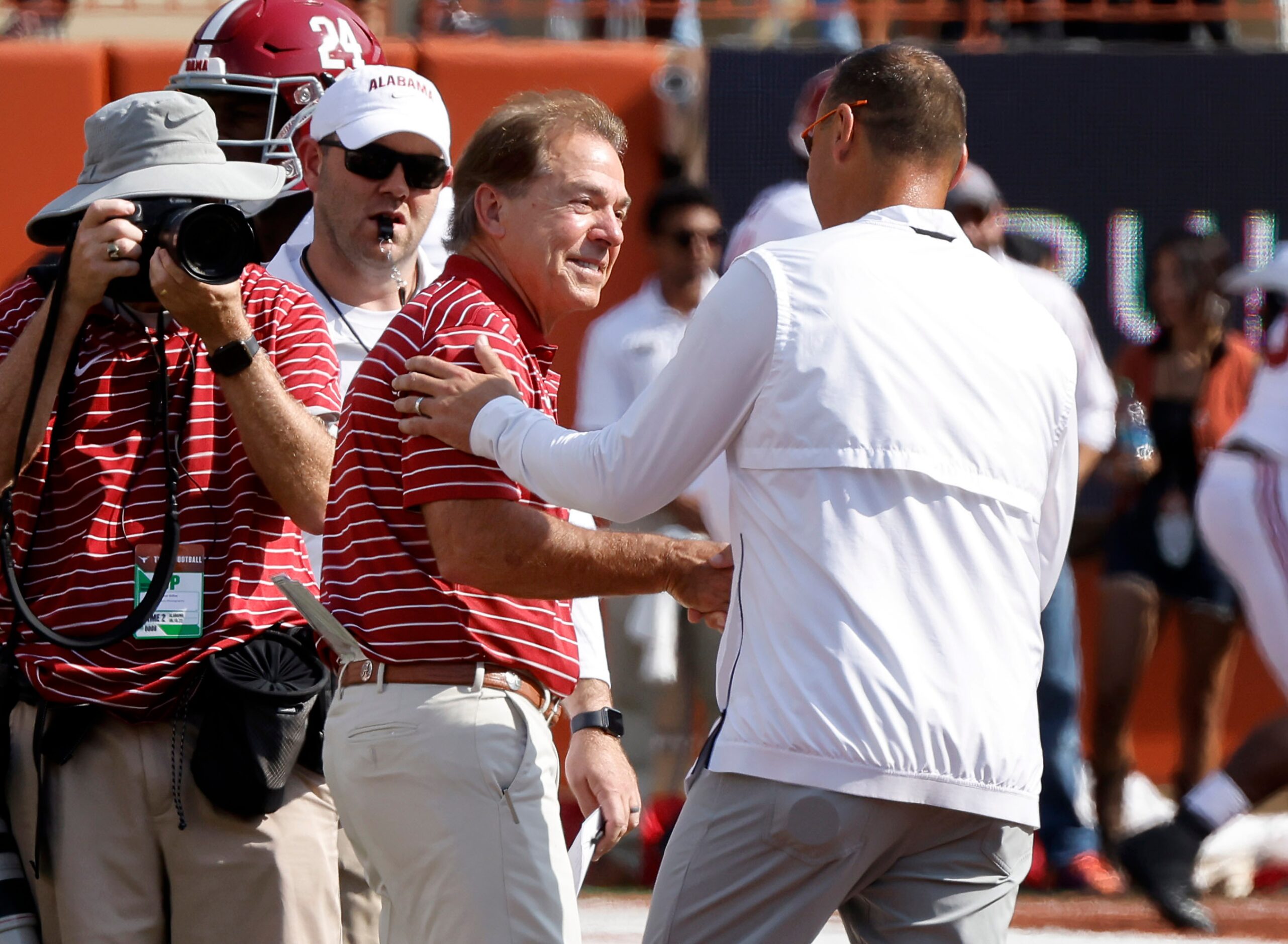 Texas Longhorns head football coach Steve Sarkisian (right) and Alabama Crimson Tide head...