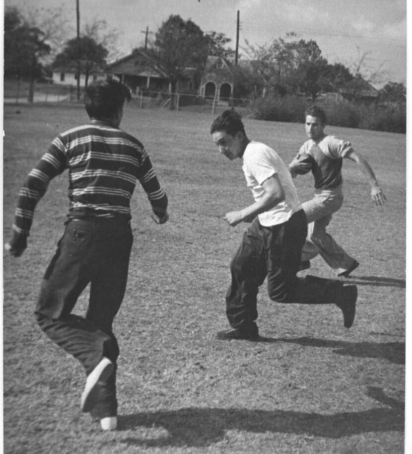 Teenage boys spent a sunny North Texas day playing football at Exline Park in Dallas in 1940.
