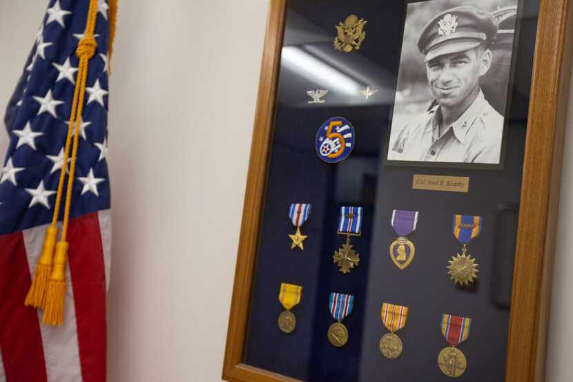 A commemorative display for Medal of Honor recipient Neel Kearby is seen inside Arlington...