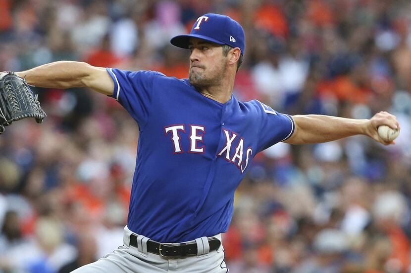 HOUSTON, TX - MAY 11:  Cole Hamels #35 of the Texas Rangers pitches in the first inning...