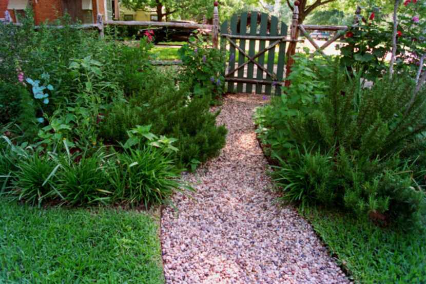 This front yard consists of a xeriscape garden that features perennials and native plants.