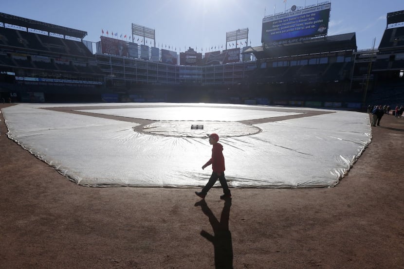 A young fan walks near home plate during the 2015 Texas Rangers Fan Fest Presented by AT&T...