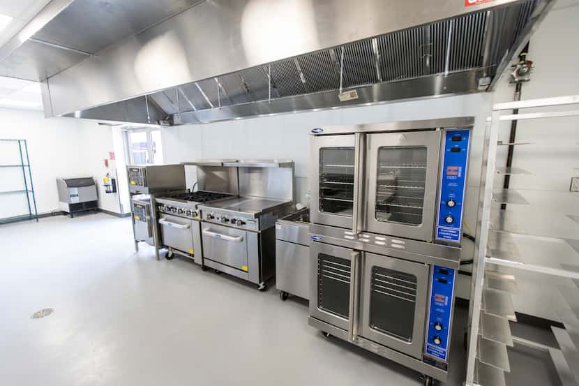 Commercial grade kitchen appliances are seen in the first-of-its-kind commercial kitchen is...