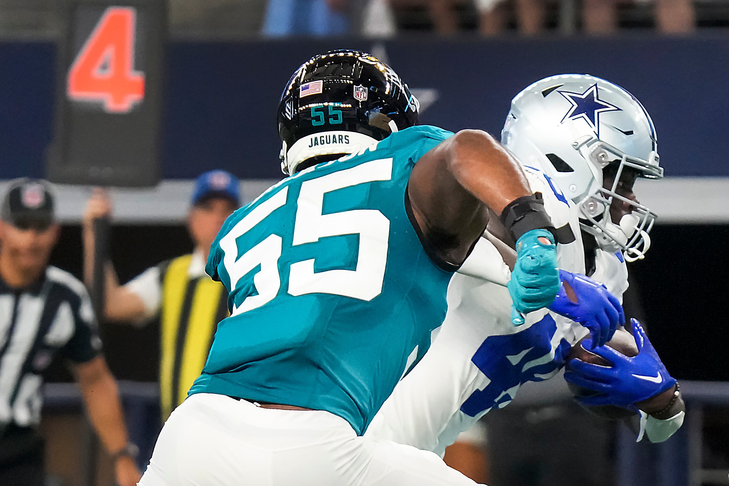 Dallas Cowboys wide receiver John Stephens Jr. (49) celebrates scoring a  touchdown during an NFL football