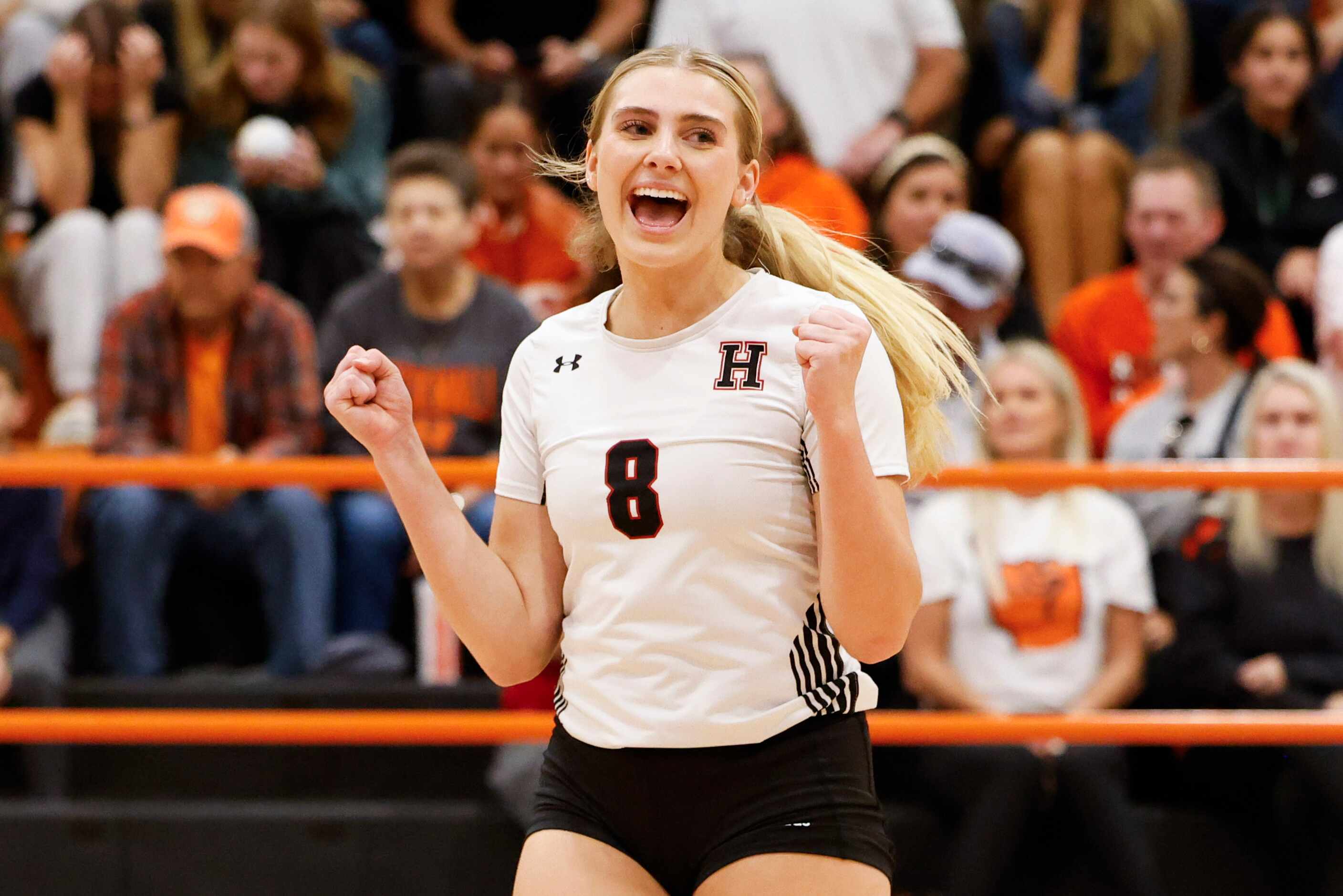 Rockwall heath’s Kenley Koetter (8) cheers after a point during a volleyball game against...
