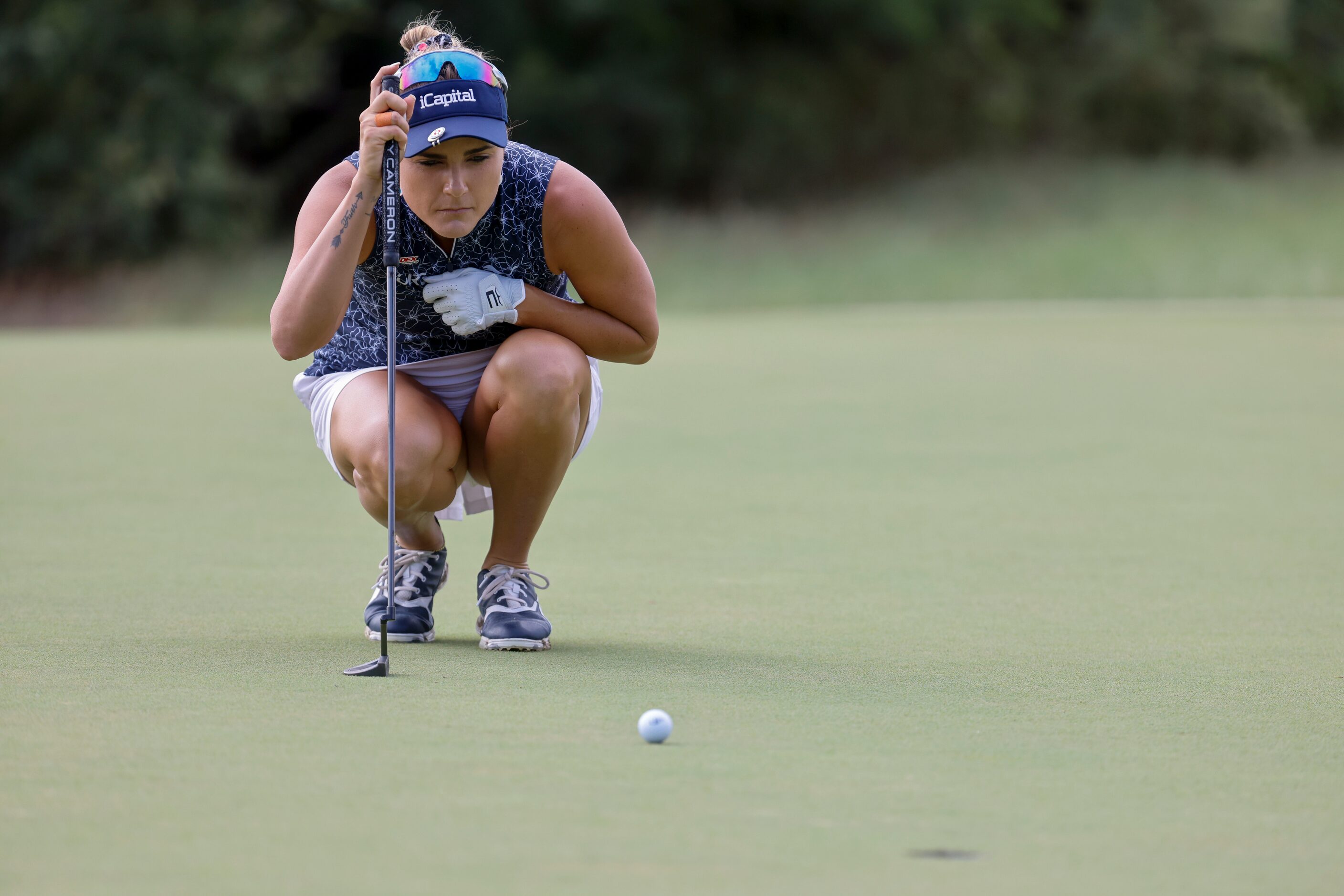 Lexi Thompson the United States lines up a putt on the seventh green during the first round...