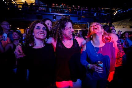 Meryl Evans (center) laughs with her friends Jennifer Peterson (left) and Jennifer Sheiner...