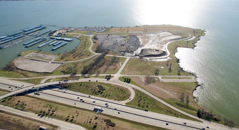 This aerial view of the south side of Interstate 30 shows the still-undeveloped portion of...