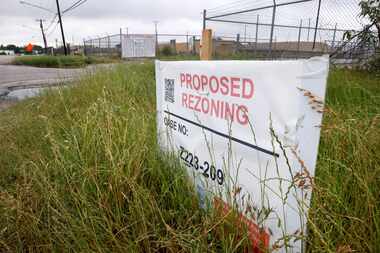 A sign for the rezoning case surrounding the Austin Bridge and Road plant in South Dallas...