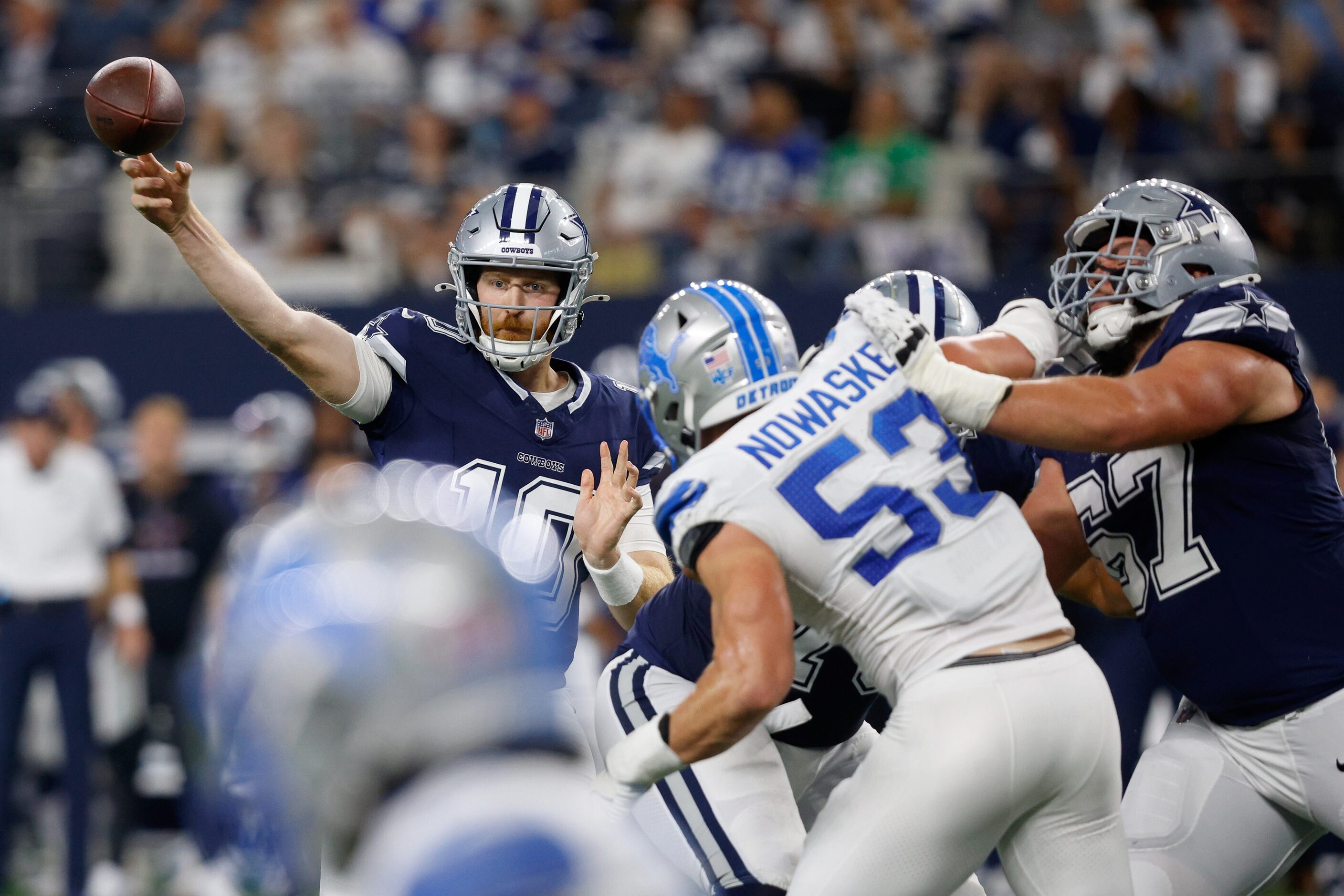 Dallas Cowboys quarterback Cooper Rush (10) passes as Dallas Cowboys center Brock Hoffman...