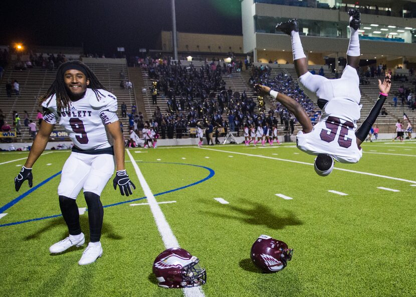 Rowlett defensive back Daylon Bryant (9) and defensive back Elijah Baker (36) celebrate...