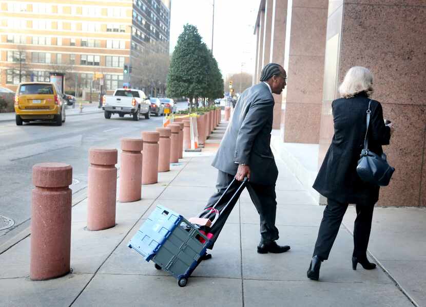 Dallas County Commissioner John Wiley Price arrives with his lawyer Shirley Baccus-Lobel for...