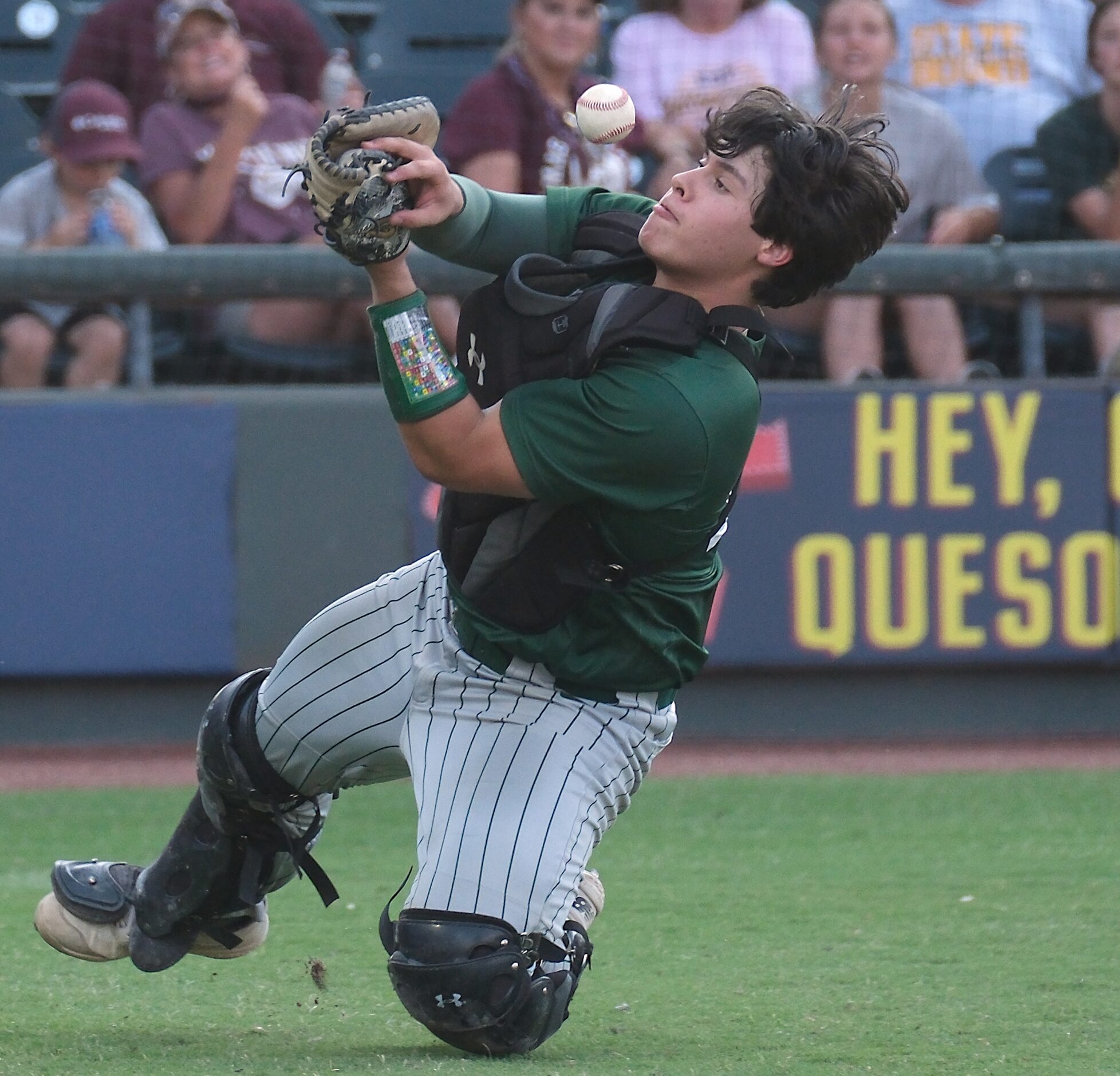 Frisco Reedy Caden Jones, (23), drops a foul ball by Magnolia West Jackson Blank, (5),...