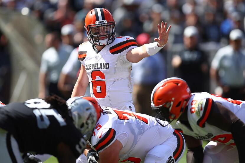 Cleveland Browns quarterback Baker Mayfield (6) signals at the line of scrimmage during the...