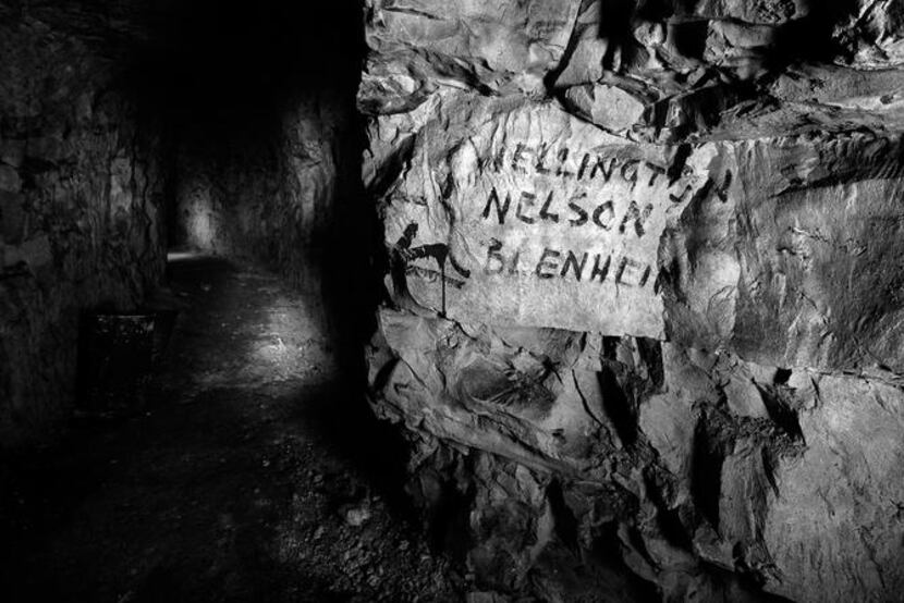 
This photo shows a street sign in an underground World War I city.
